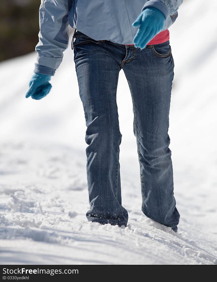 woman walking in deep snow