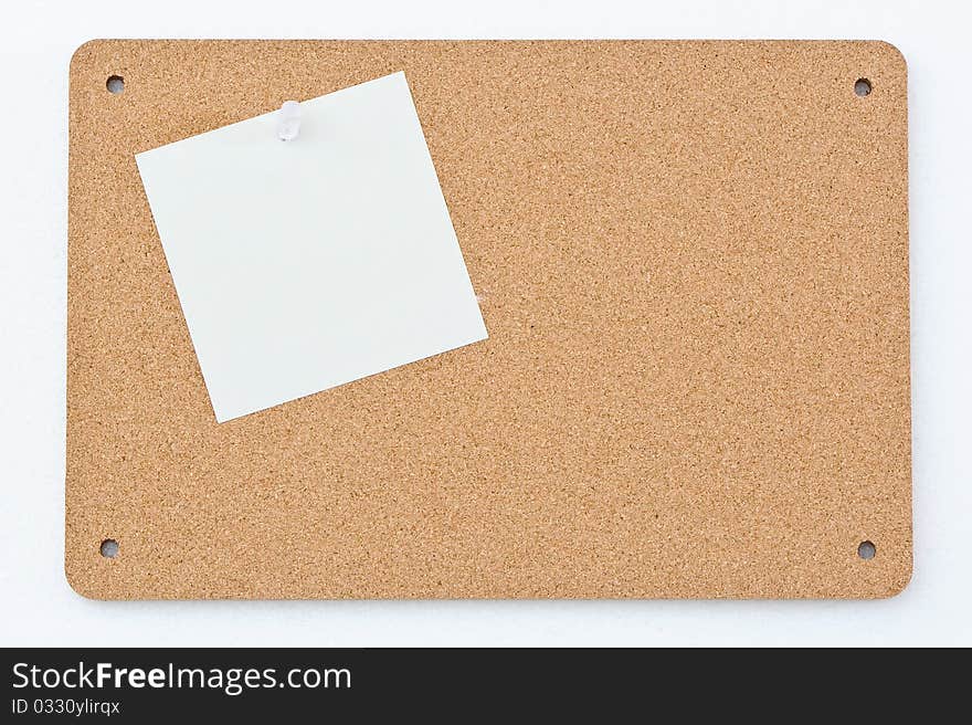 Empty post note posted on a message board ready for designers to easily add their messages to it. Empty post note posted on a message board ready for designers to easily add their messages to it.