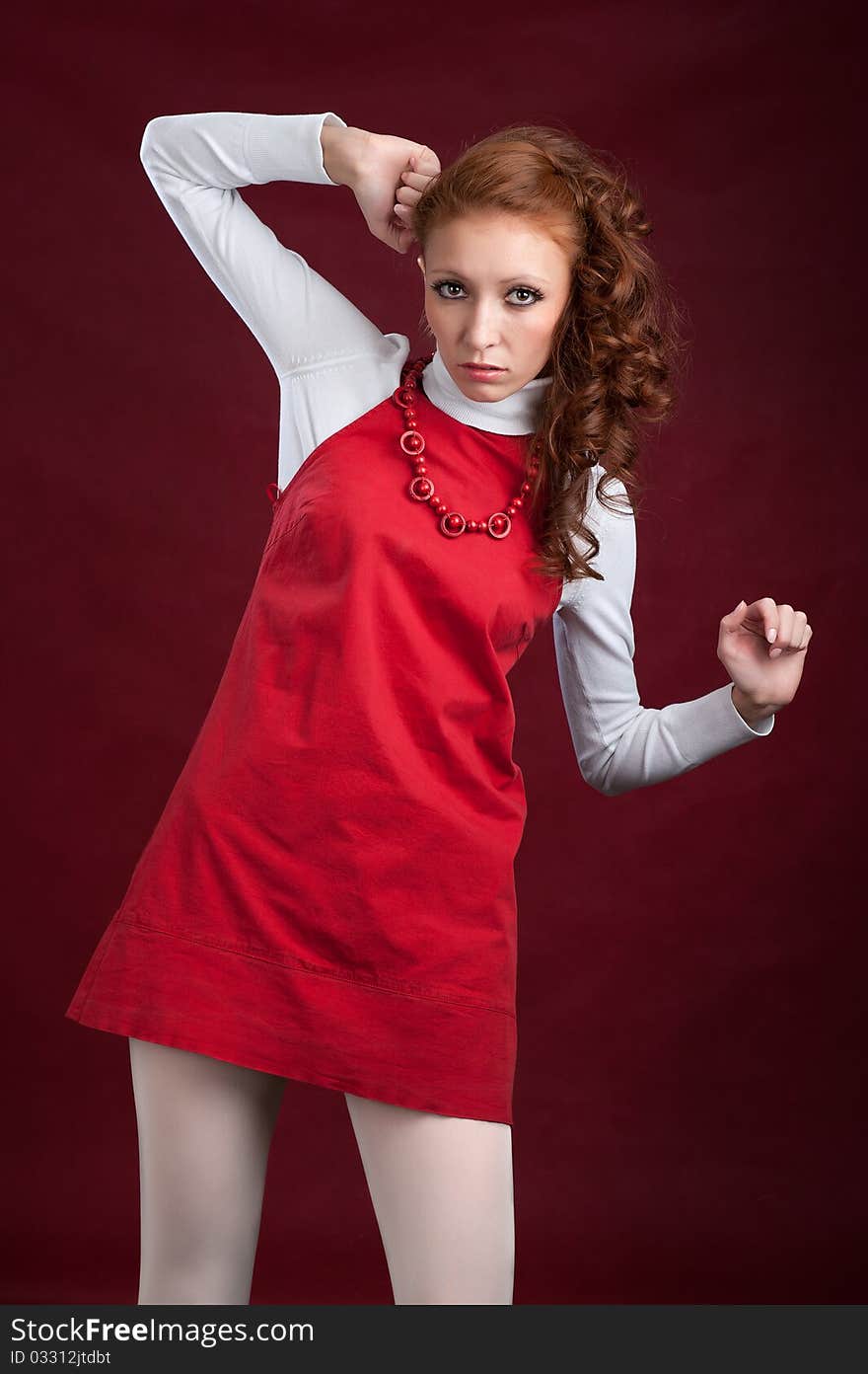 Young beautiful lady in red dress. Young beautiful lady in red dress