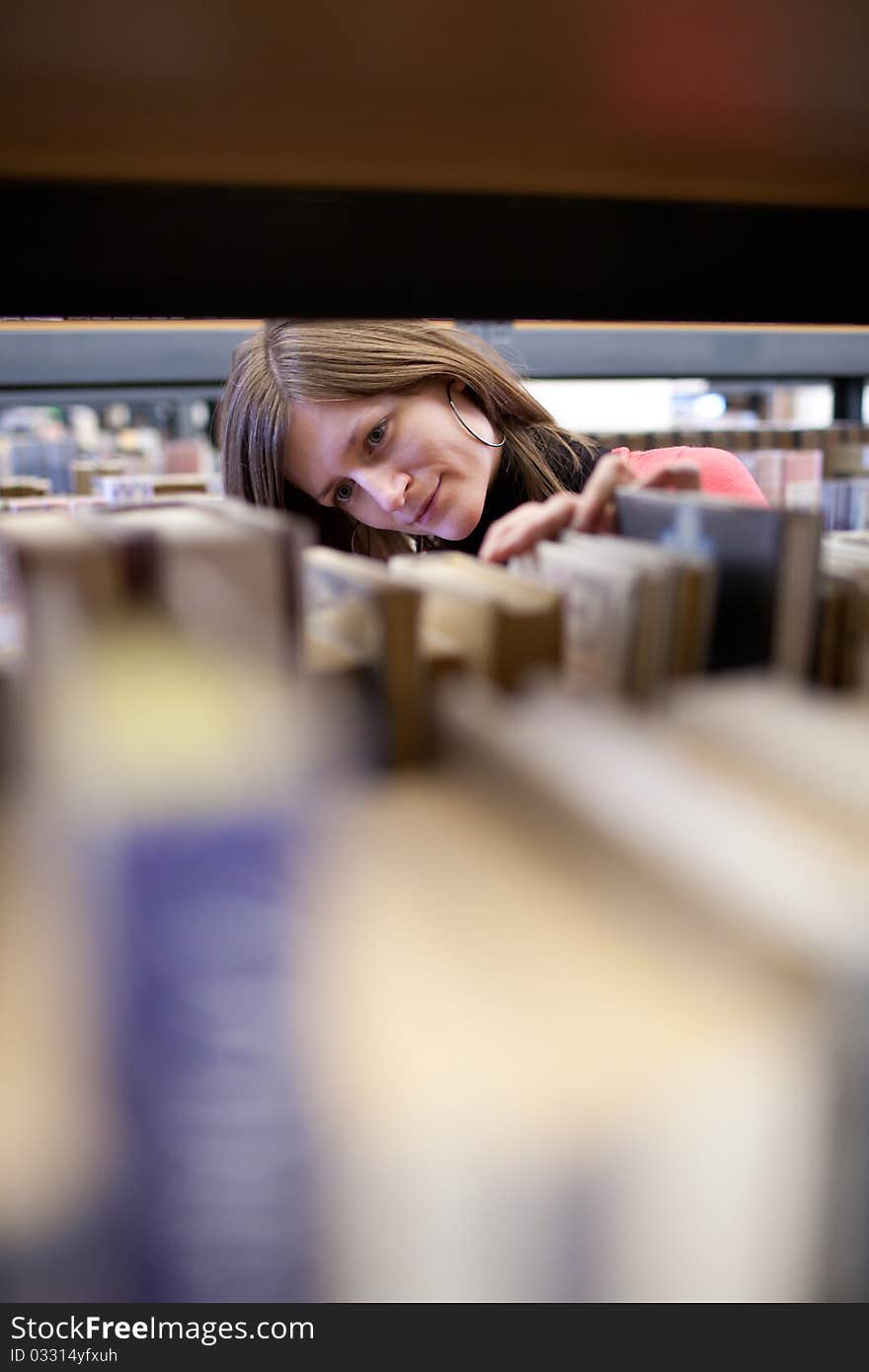 College Student In A Library