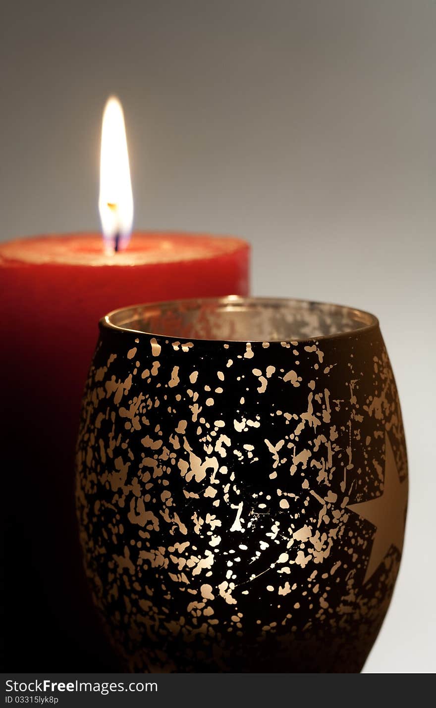 Few burning candle over abstract backgrounds