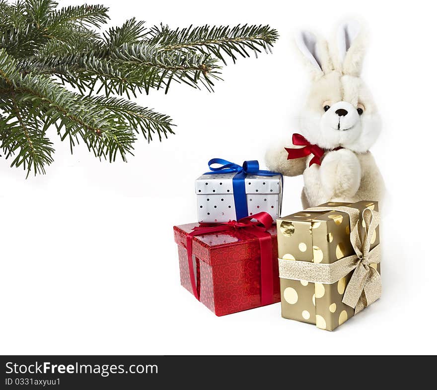 Gift boxes with rabbit and christmas tree