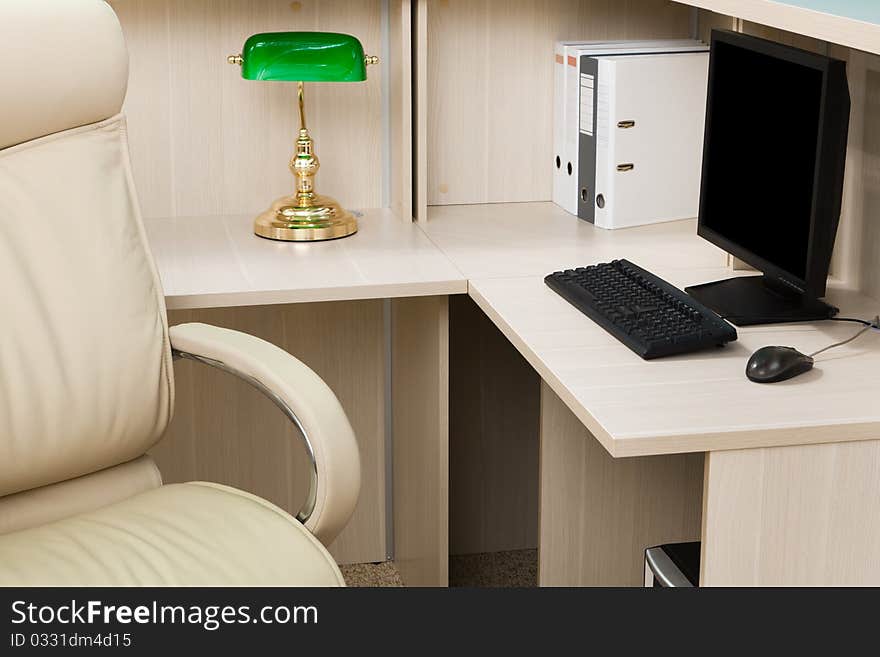 White leather armchair in a modern office