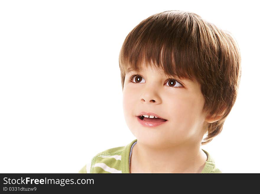 Portrait of happy little smiling boy looking up on white background. Portrait of happy little smiling boy looking up on white background