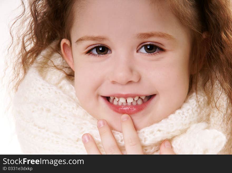 Close-up portrait � happy smiling little girl, studio shot. Close-up portrait � happy smiling little girl, studio shot