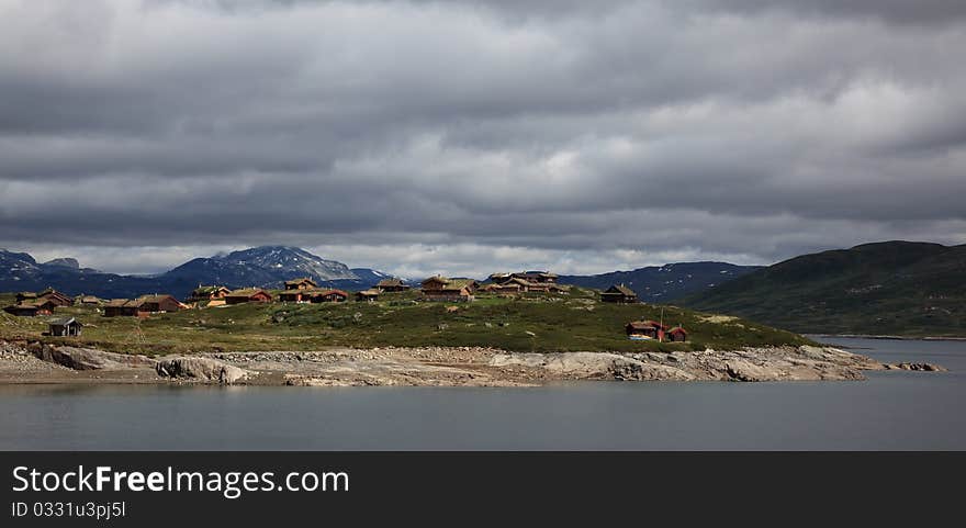 Peninsula with recreational huts, norwegian place for holidays. Peninsula with recreational huts, norwegian place for holidays