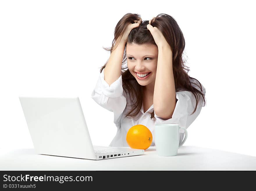 A beautiful young female woman enjoying a cup of tea/coffee. A beautiful young female woman enjoying a cup of tea/coffee