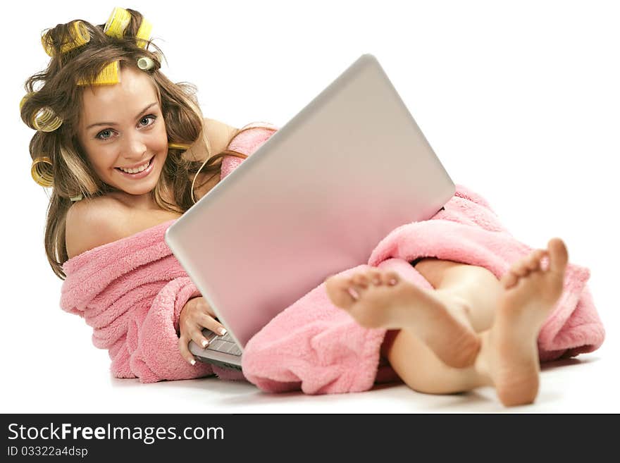 Girl In Pink Dressing Gown Sitting With Laptop