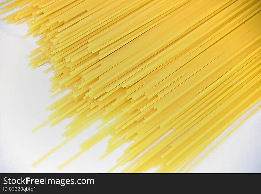 Yellow spaghetti on white background. Yellow spaghetti on white background