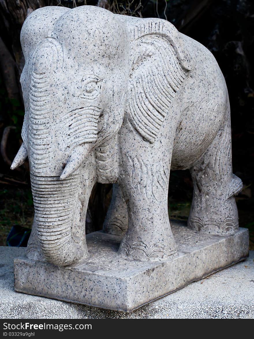 Elephant statue by stone stay at outdoor