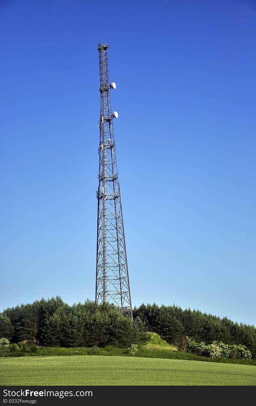 Radio tower with satellite dish