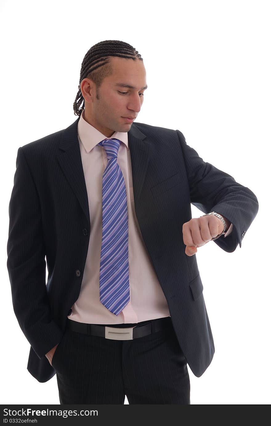 Photograph showing young business man isolated against white keeping an eye on time