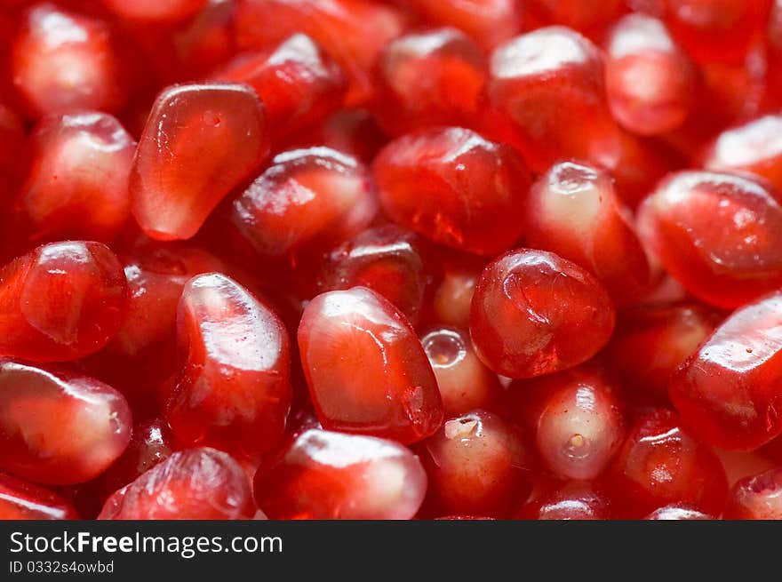 Macro of peeled ripe seeds pomegranate