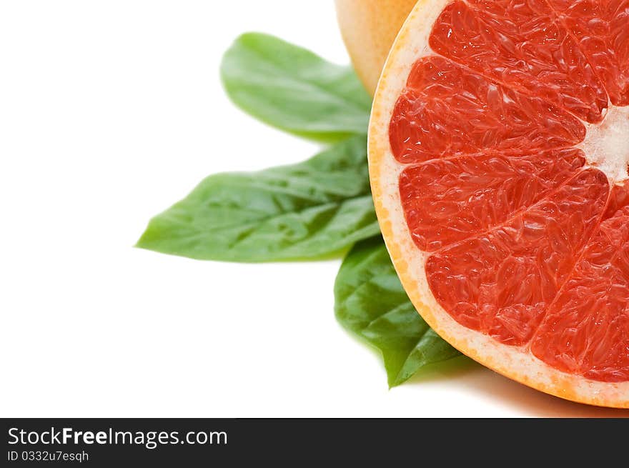 Fresh Juicy Grapefruits With Green Leafs