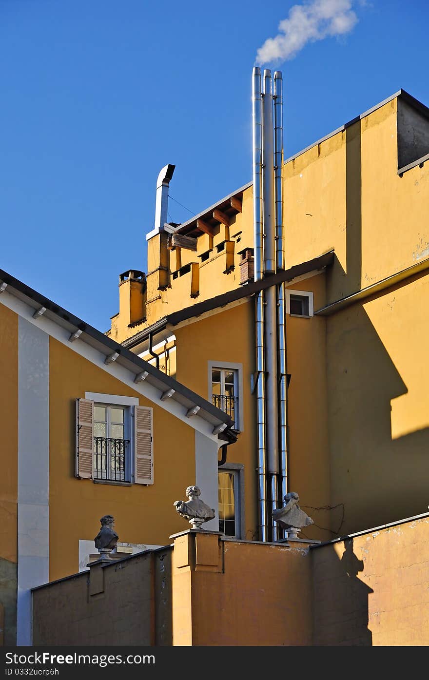 Colorful facade of apartment building against deep blue sky, Turin, Piedmont, Italy. Colorful facade of apartment building against deep blue sky, Turin, Piedmont, Italy.