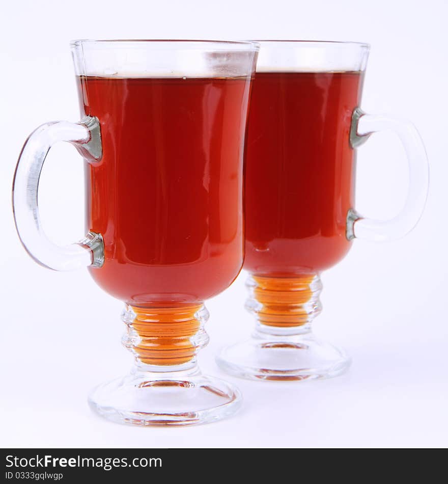 Two glasses of tea on white background