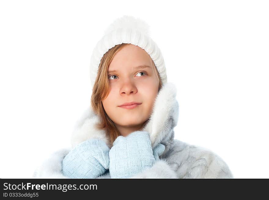 Cute little girl in warm clothes on white background