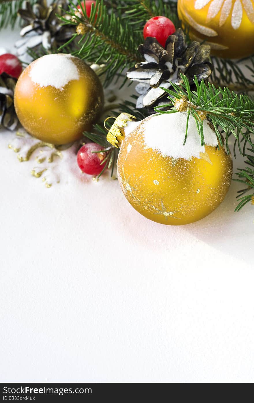 Bright christmas baubles and xmas tree on the snow. Bright christmas baubles and xmas tree on the snow.