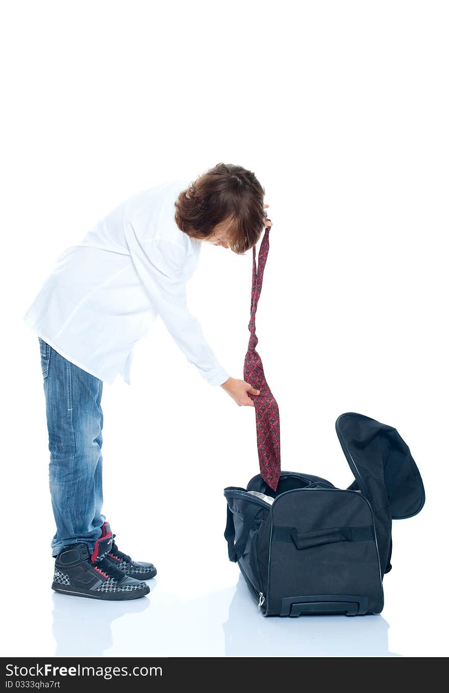 Boy traveler on a white background