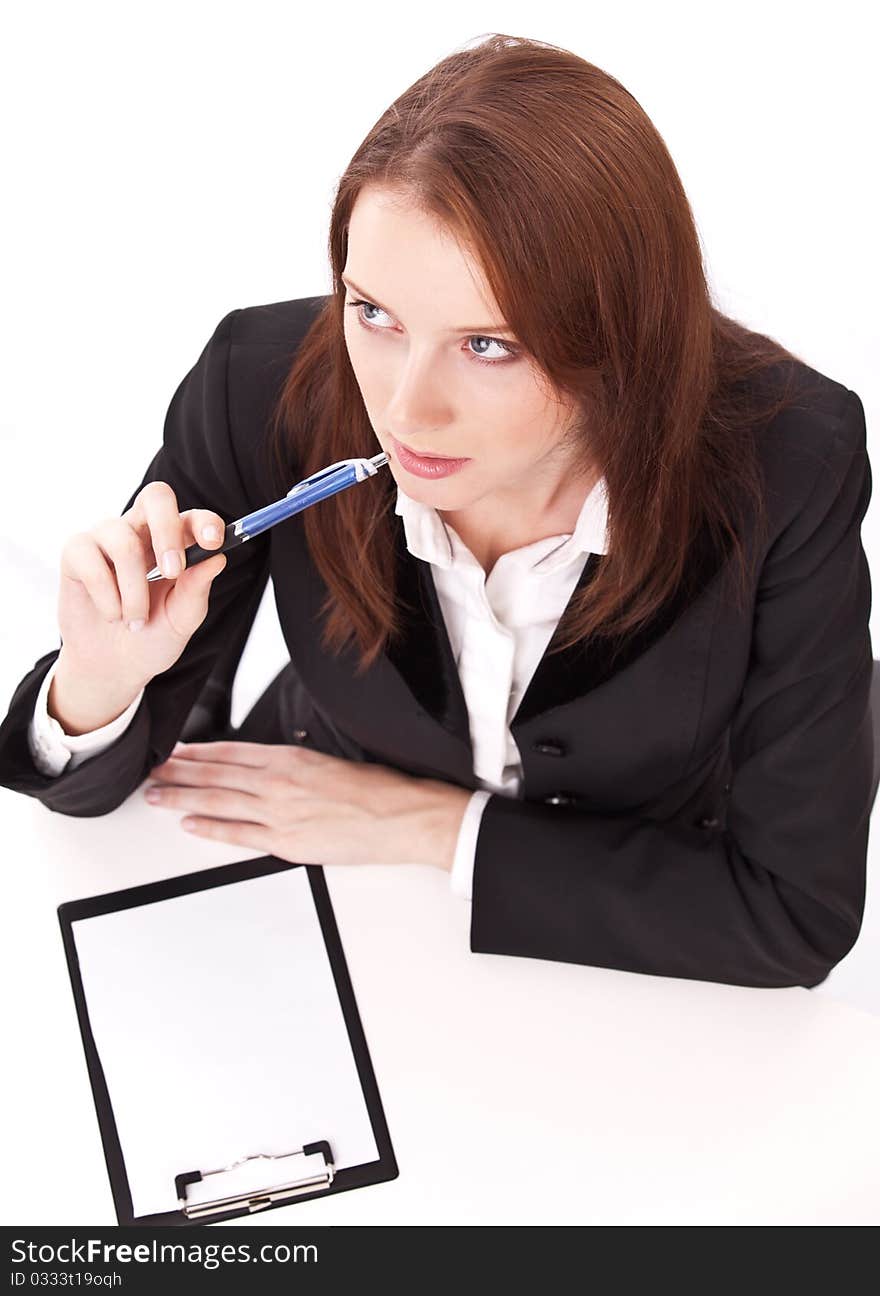 Exams passing. Young woman sitting at the table.