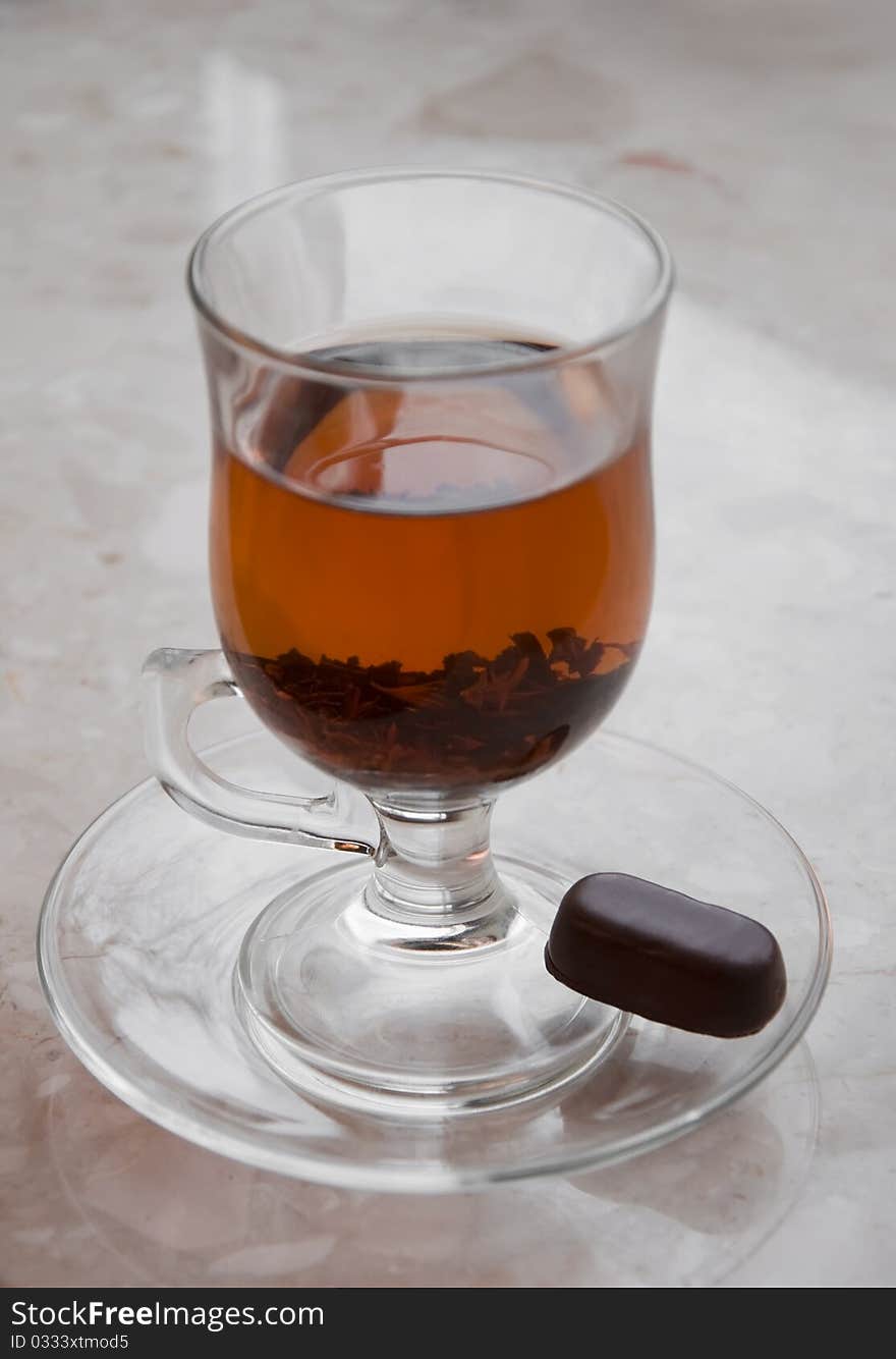 Cup of tea with candy