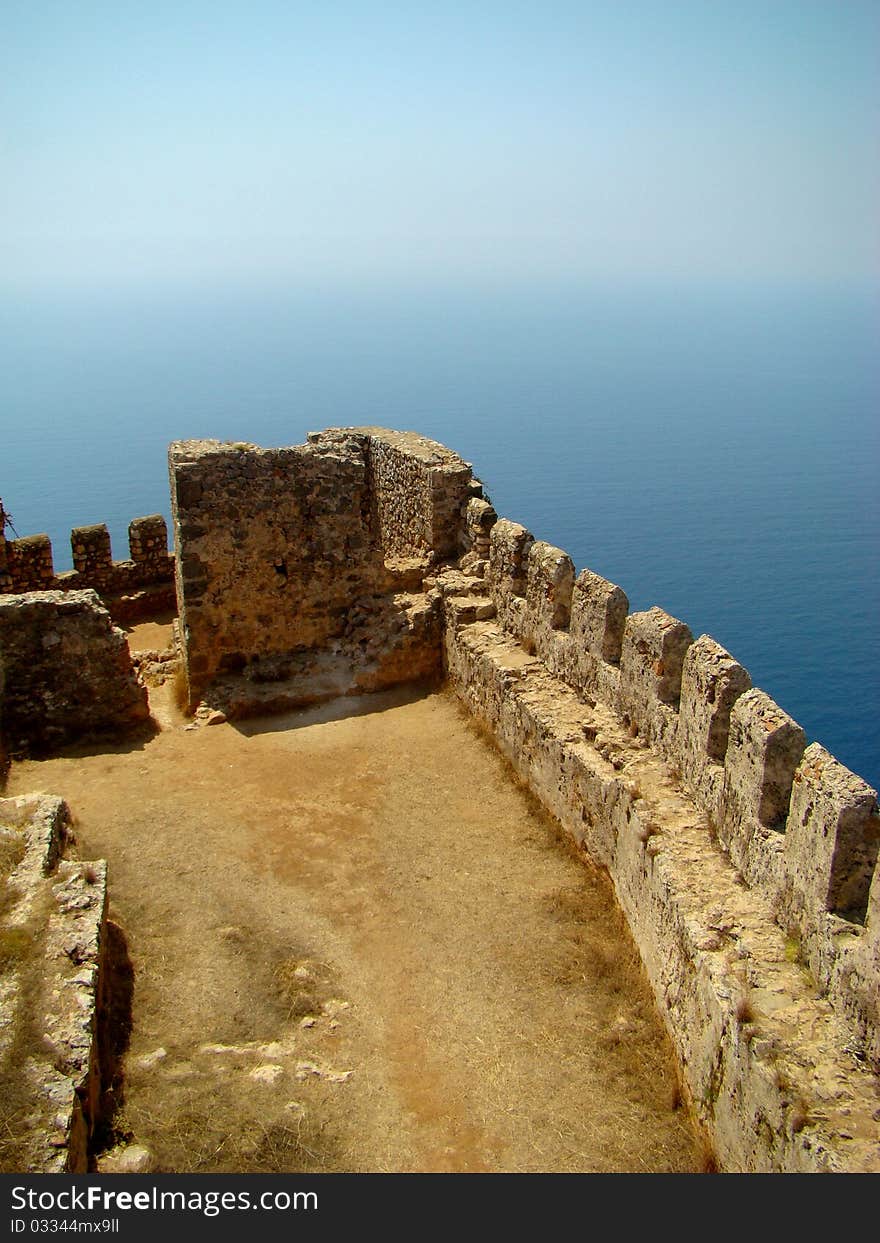 Alanya Castle. The XIII century. The fragment. Turkey The fortress is located at mountain top. Coast Mediterranean sea. Alanya Castle. The XIII century. The fragment. Turkey The fortress is located at mountain top. Coast Mediterranean sea