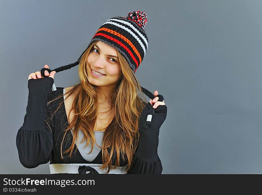 Portrait of beautiful young girl in winter day