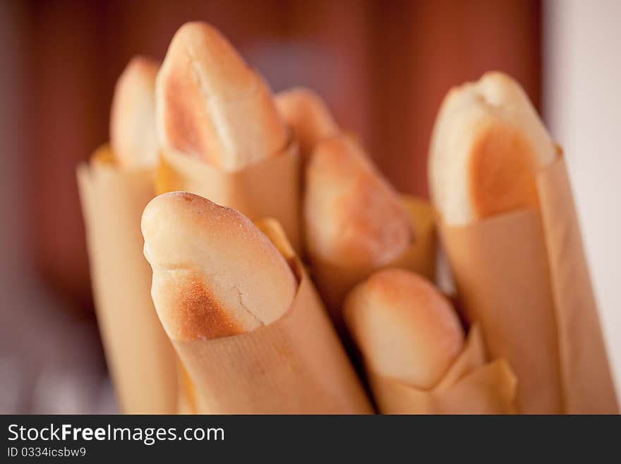 Basket of fresh baguettes just backed. Basket of fresh baguettes just backed