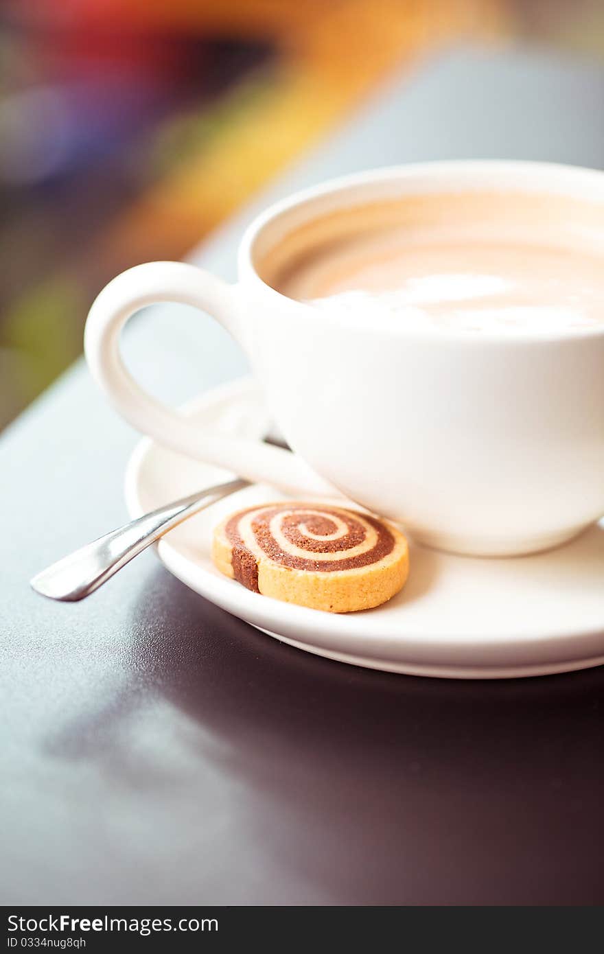 Cup of french cappucino with cake. Cup of french cappucino with cake