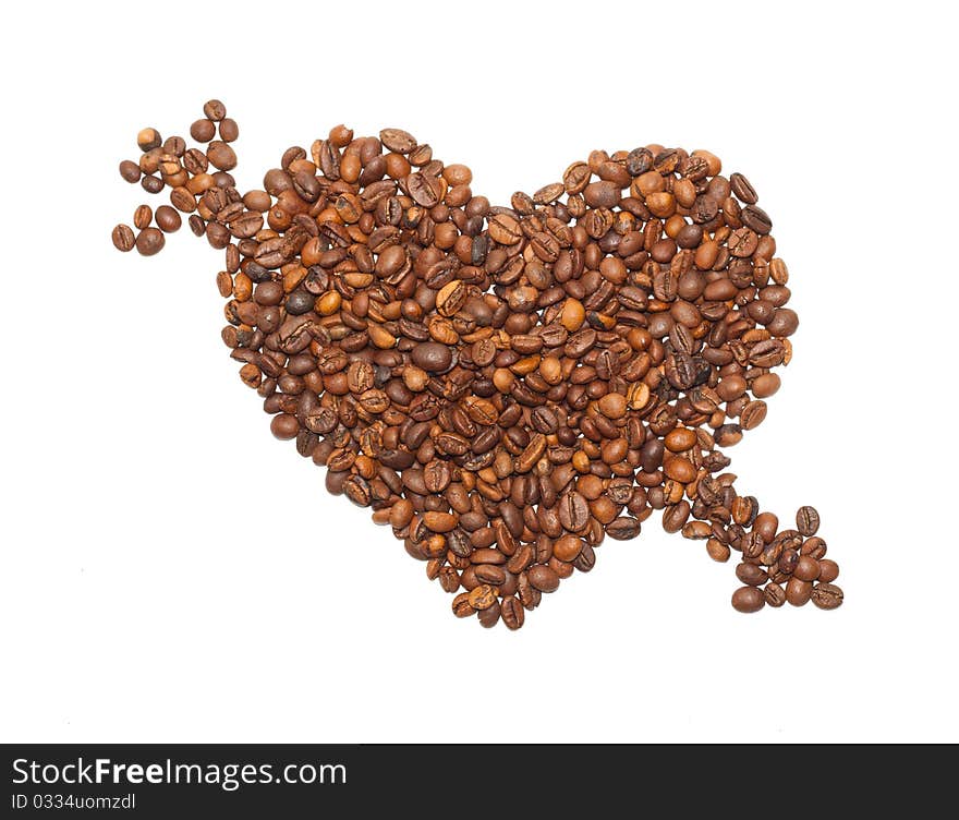 Heart is broken through an arrow from the corns of coffees isolated on a white background