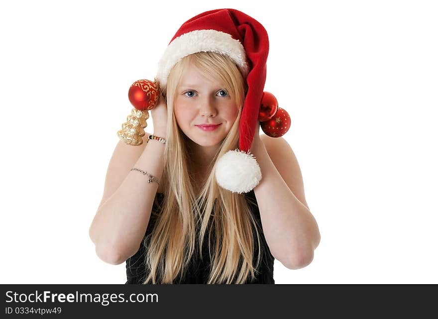 Young beautiful girl in a Santa hat on a white background