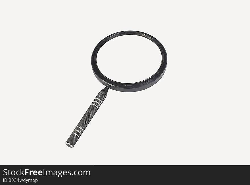 The magnifier isolated on the white