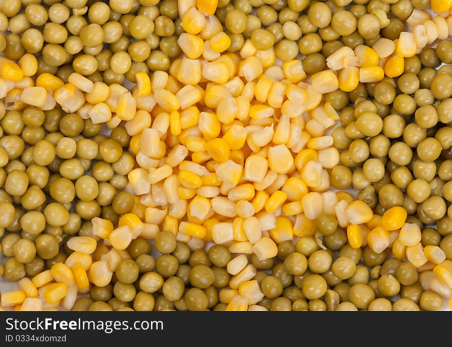 Yellow corn and green beans are stacked background