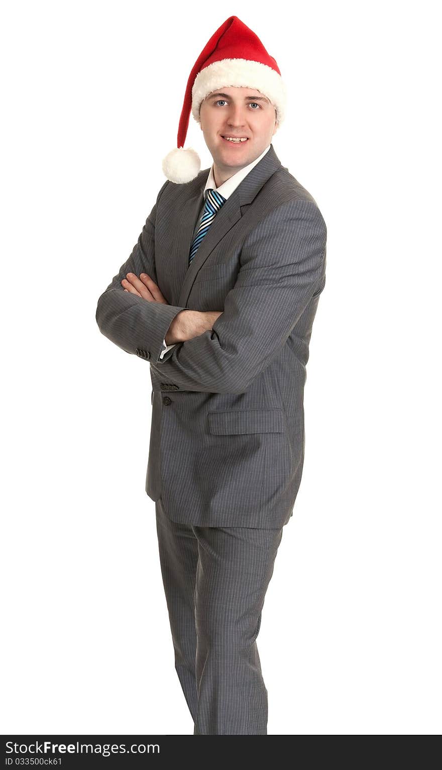 Man in gray suit with tie in hat santa on white background