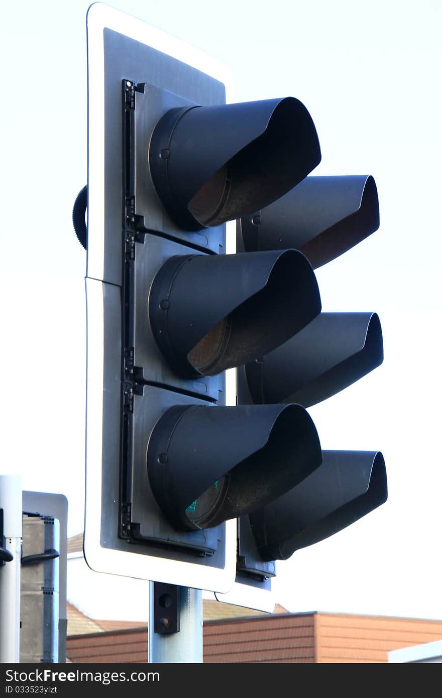 Image of traffic light changing to green