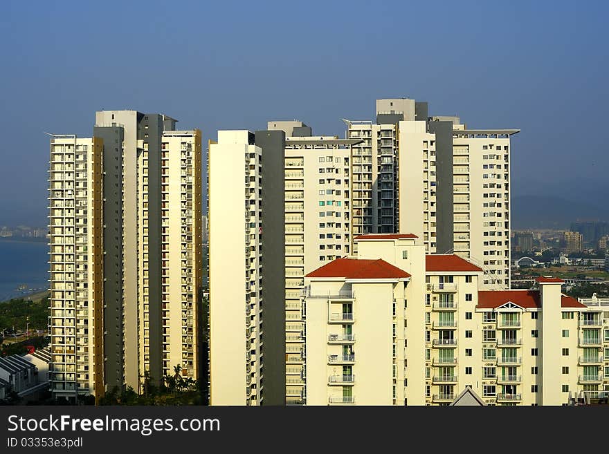 High-rise building in the blue sky, colorful, very tall and spectacular