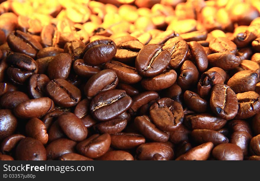 image of coffee on a table with light on it