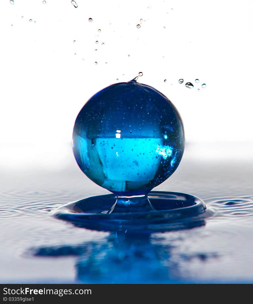 Water spheres frozen action on white background. Water spheres frozen action on white background