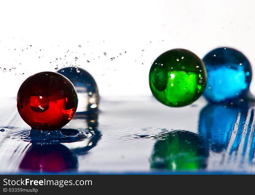 Water spheres frozen action on white background. Water spheres frozen action on white background