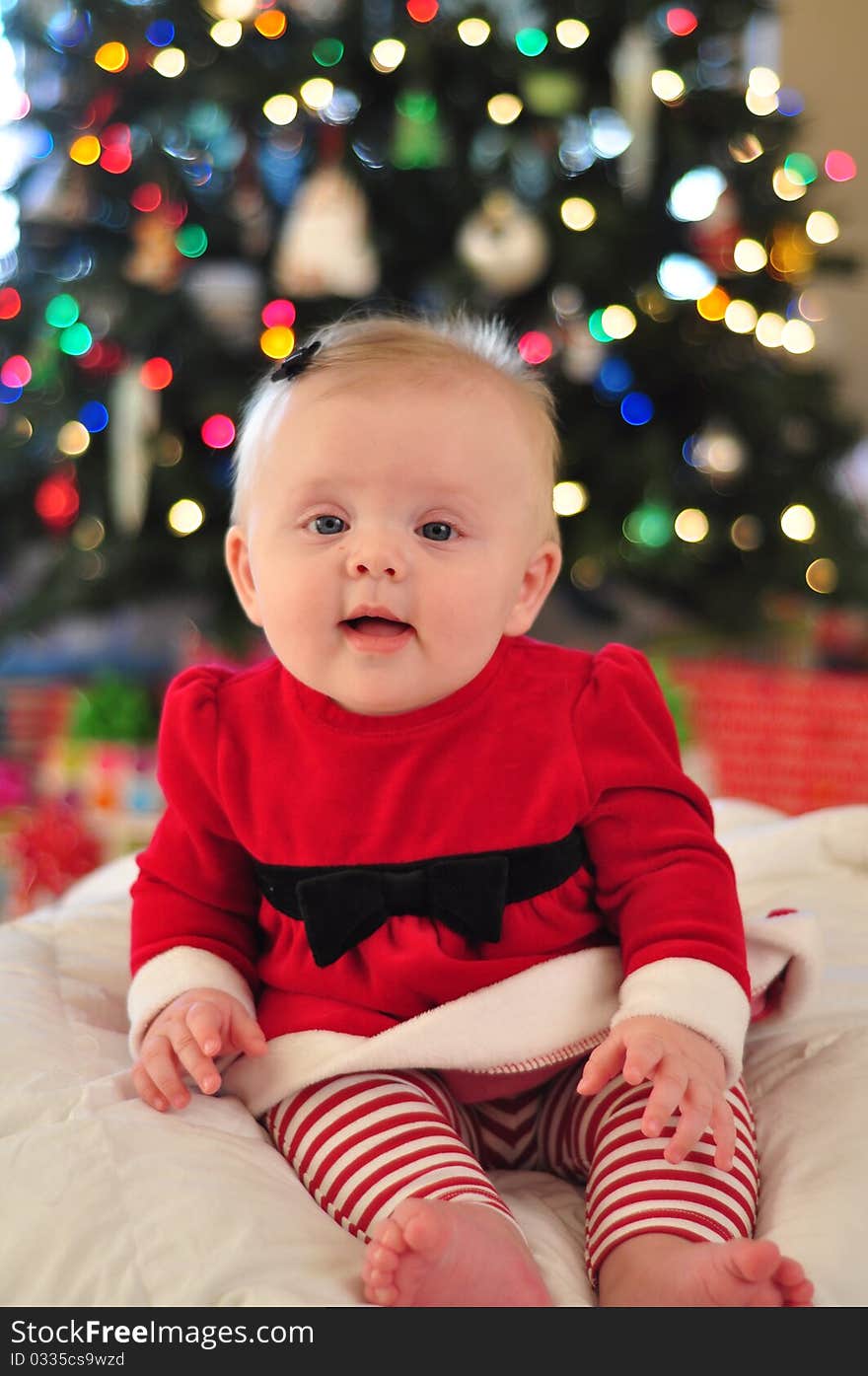 Happy Baby Girl in santa outfit for christmas. Happy Baby Girl in santa outfit for christmas