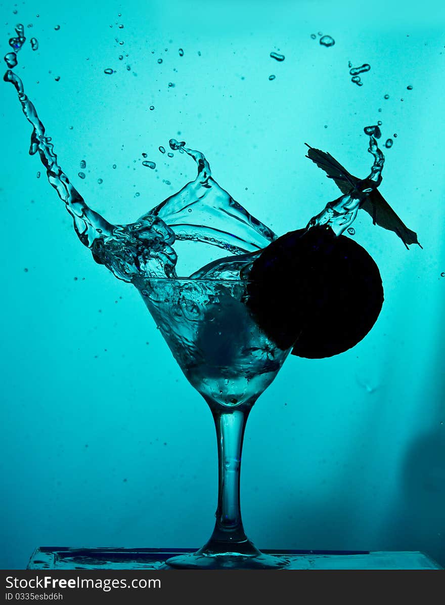 Drink splashes on blue background. Drink splashes on blue background