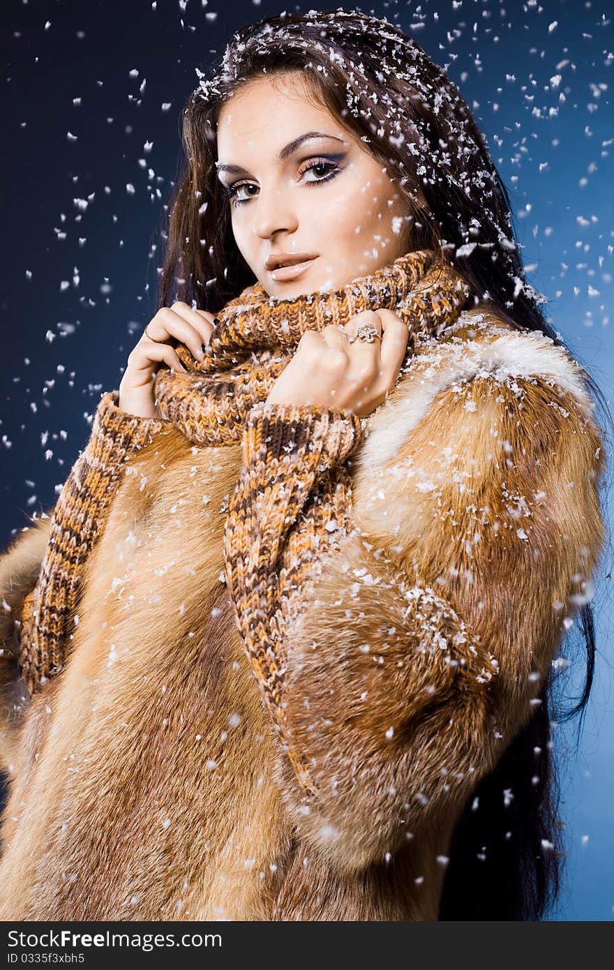 Beautiful woman in a fur coat