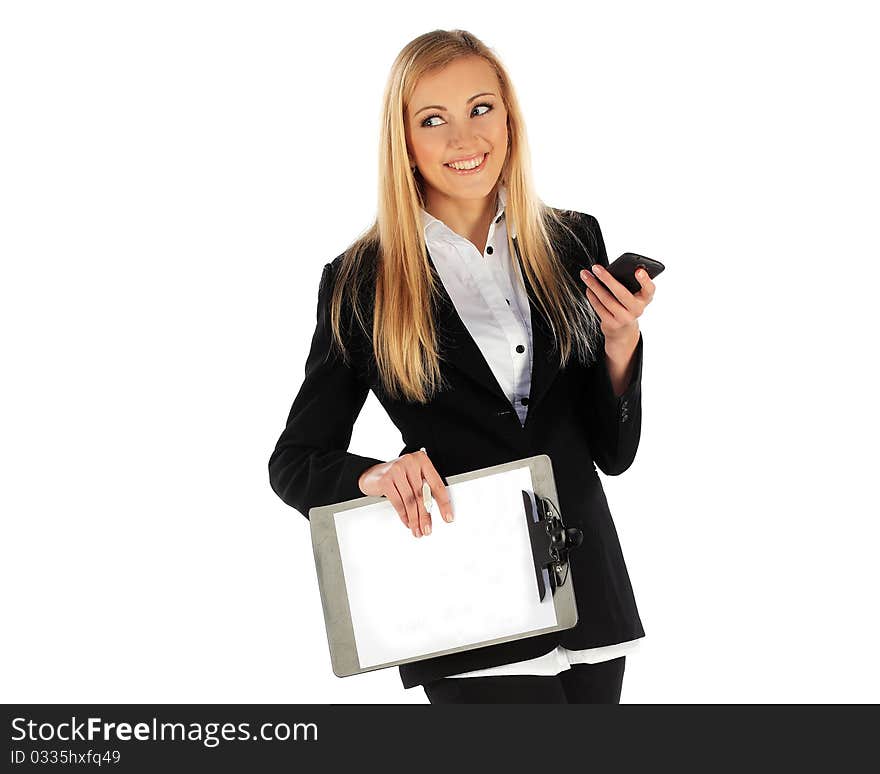 Business girl smiling while texting message on mobile phone