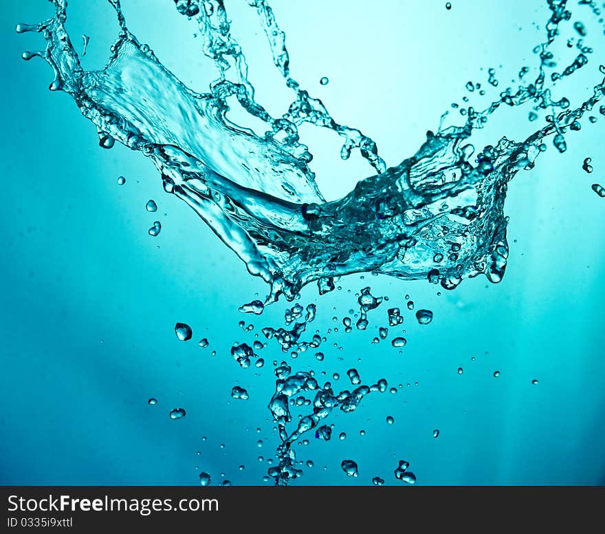 Water Splashes on blue background. Water Splashes on blue background