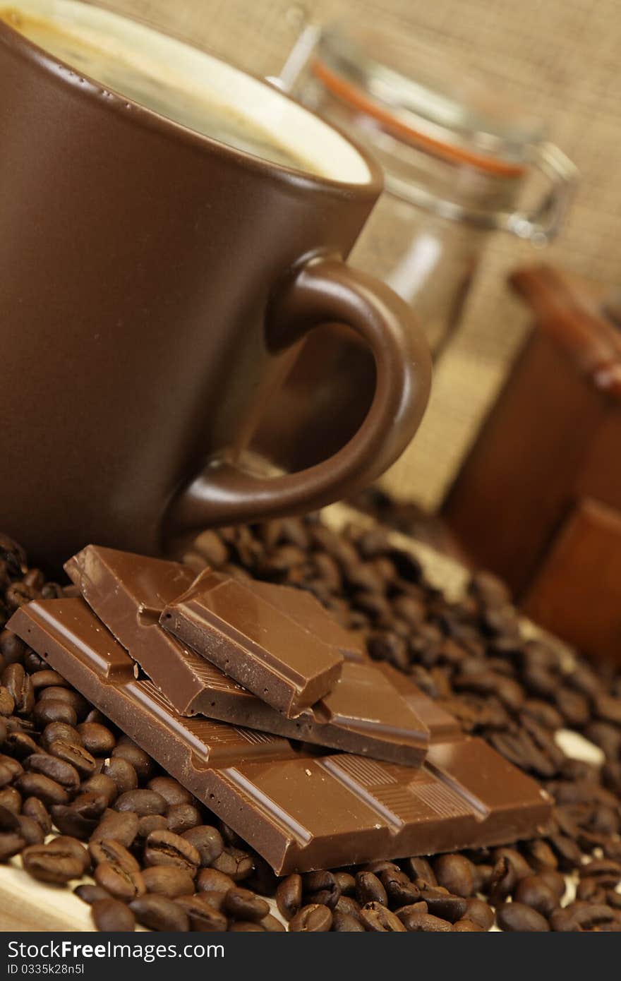 Coffee with chocolated on dark background. Coffee with chocolated on dark background