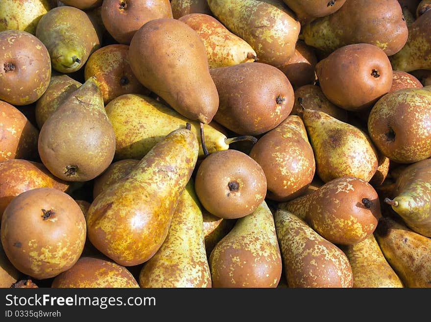 Fresh ripe yellow pears at the market