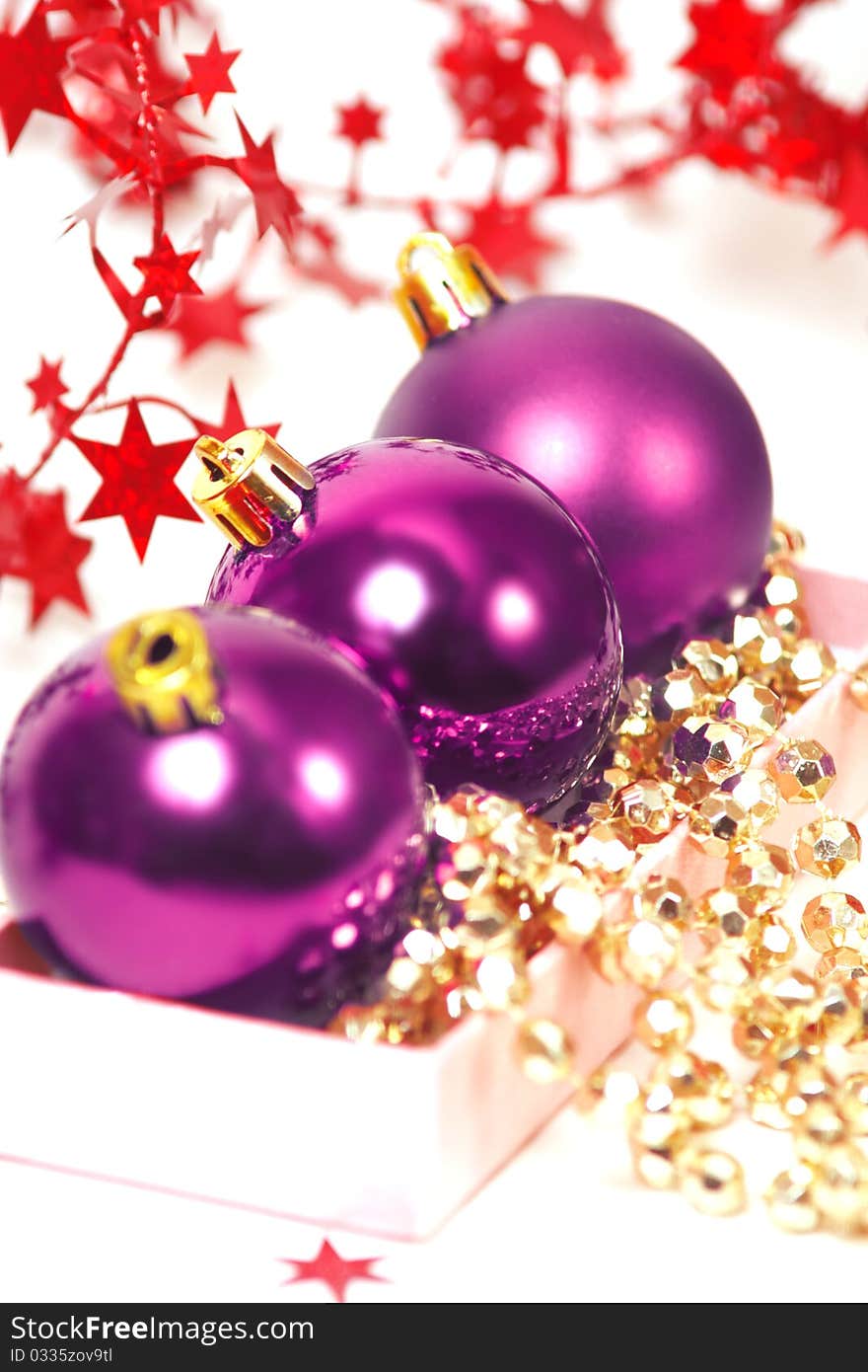 Three chrispmas purple balls