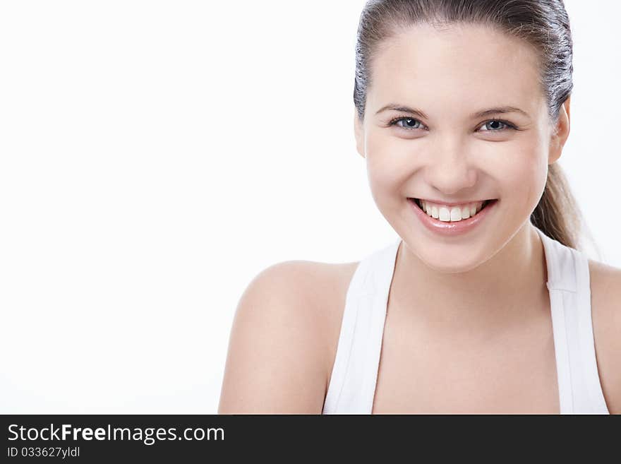 Young smiling girl on white background. Young smiling girl on white background