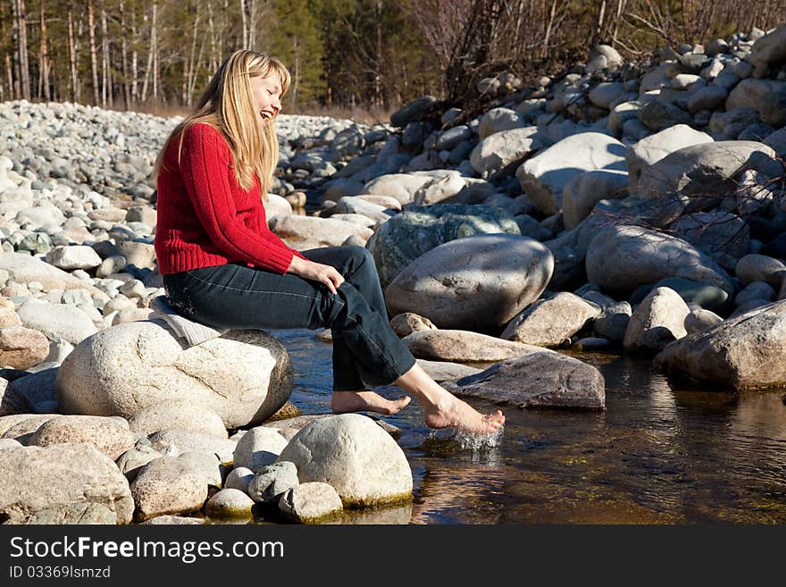 Beauty woman washes legs