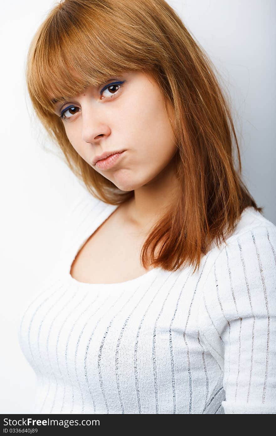 Portrait of a beautiful female model on white background